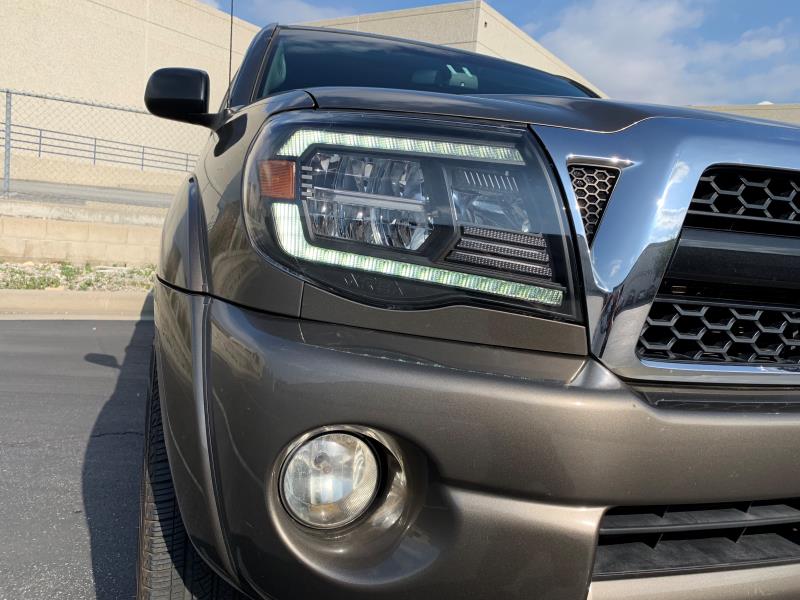 AlphaRex 880735 05-11 Toyota Tacoma LUXX Crystal Headlights Plank Style Design Black with Activation Light/DRL