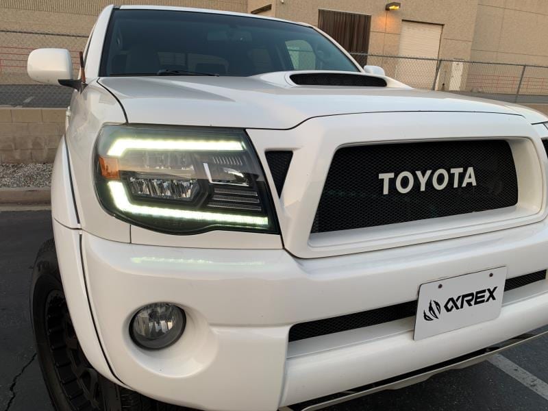 AlphaRex 880735 05-11 Toyota Tacoma LUXX Crystal Headlights Plank Style Design Black with Activation Light/DRL