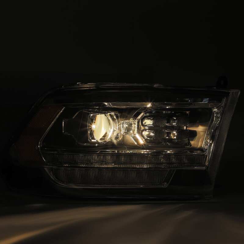 AlphaRex 880523 09-18 Dodge Ram 1500 HD PRO-Series Projector Headlight Plank Style Black with Chrome Acc with Sequential Signal/DRL