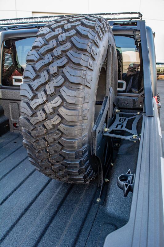 DV8 Offroad 2019+ Jeep Gladiator Universal Stand Up In-Bed Tire Carrier - #TCGL-02