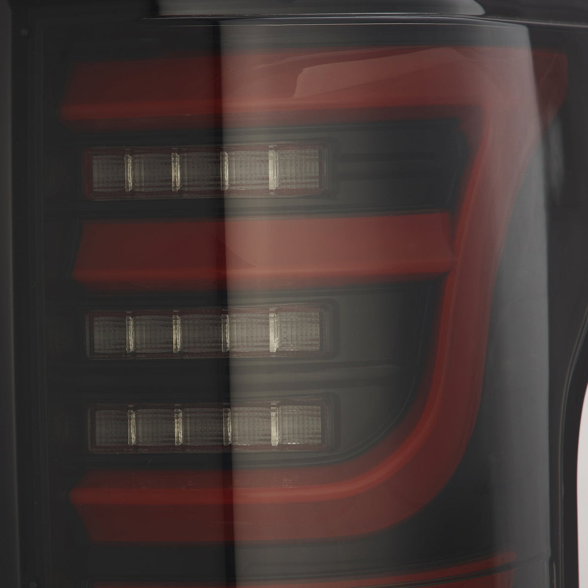 AlphaRex 652050 15-20 Ford F-150 Luxx LED Tail Lights (Pair) Black/Red (Not For Blind Spot Sensor Models)