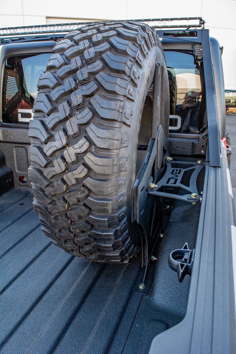 DV8 Offroad 2019+ Jeep Gladiator Universal Stand Up In-Bed Tire Carrier - #TCGL-02