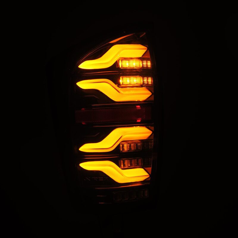 AlphaRex 680080 16-21 Toyota Tacoma LUXX LED Taillights Alpha Black w/Activation Light/Sequential Signal