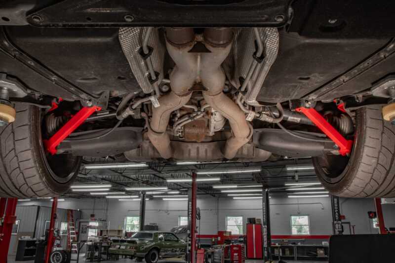 UMI Performance 2540-R Suspension Trailing Arm Red for 2016-2024 Camaro