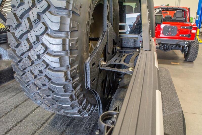DV8 Offroad 2019+ Jeep Gladiator Universal Stand Up In-Bed Tire Carrier - #TCGL-02