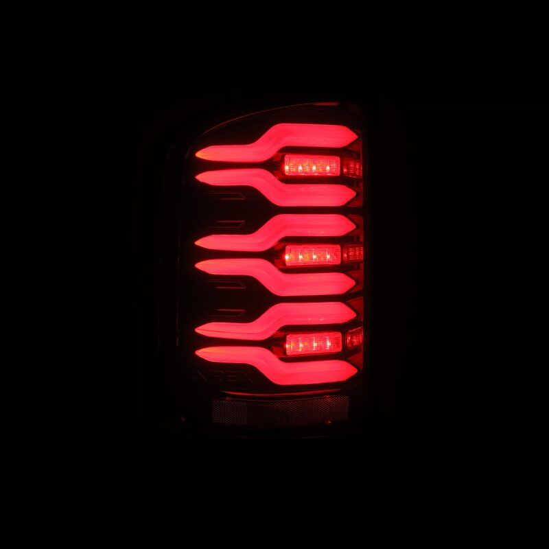 AlphaRex 630050 14-18 GMC Sierra 1500/2500 HD/3500 HD LUXX-Series LED Tail Lights Black/Red w/Activation Light Sequential Signal