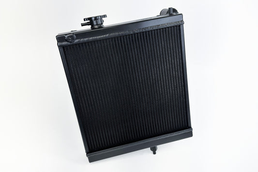CSF 7228B Radiator - Black for 03-07 Mitsubishi Lancer EVO 7/8/9 1/2 Size