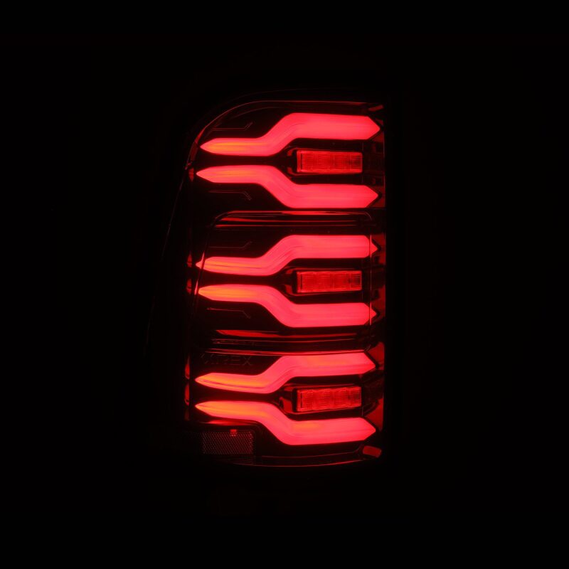 AlphaRex 640050 19-21 Dodge Ram 1500 Luxx-Series LED Tail Lights Black/Red w/Activation Light/Sequential Signal