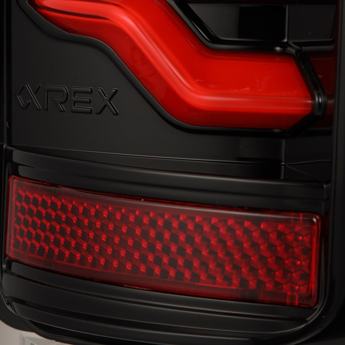 AlphaRex 658007 87-96 Ford Bronco/F-150 Luxx-Series LED Tail Lights - Black Red
