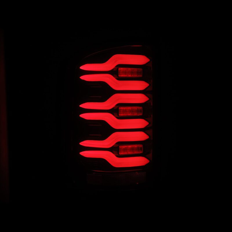 AlphaRex 630050 14-18 GMC Sierra 1500/2500 HD/3500 HD LUXX-Series LED Tail Lights Black/Red w/Activation Light Sequential Signal