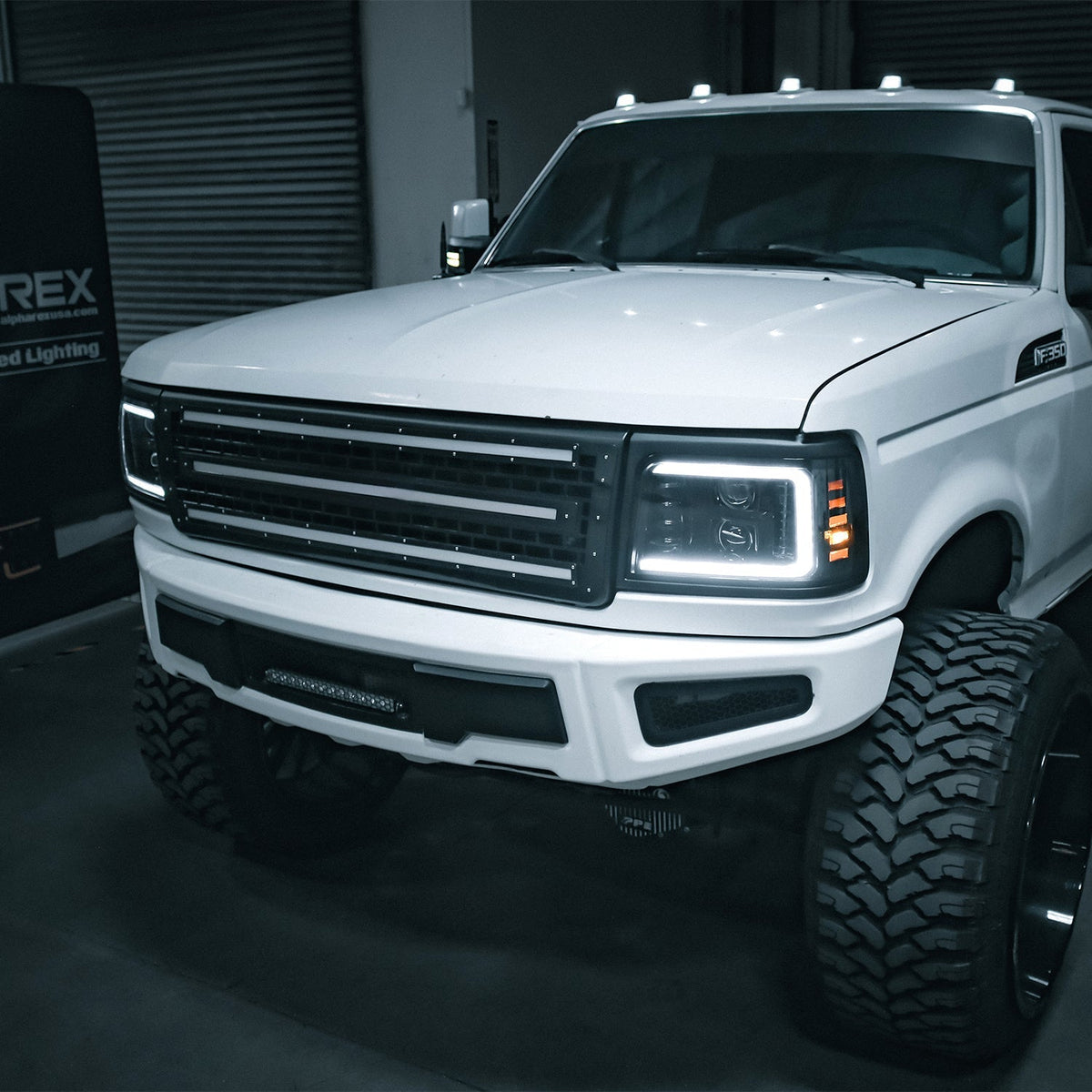 AlphaRex 880265 92-96 Ford F-Series/Bronco PRO-Series Projector Headlights Alpha-Black with Sequential Signal & DRL