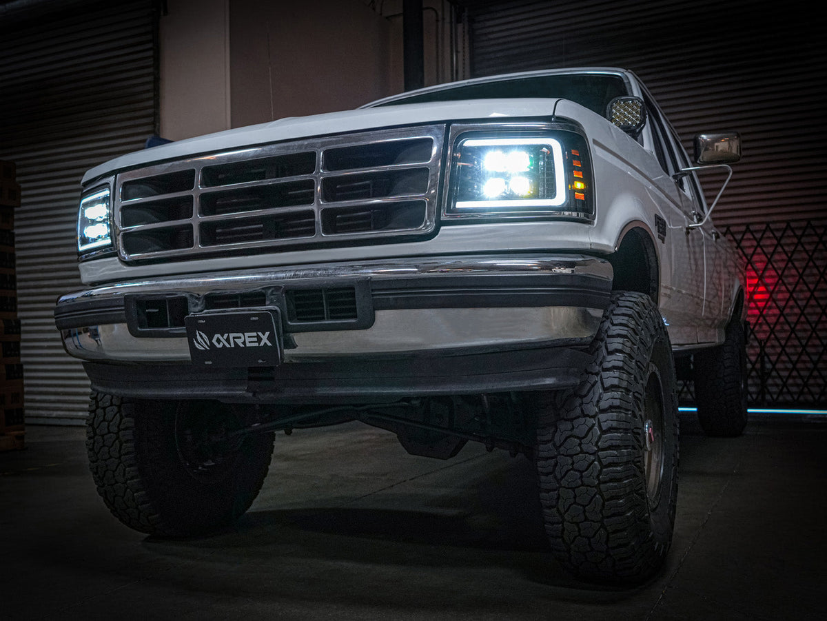 AlphaRex 880299 92-96 Ford F-Series/Bronco NOVA-Series LED Projector Headlight Bk with Activation Light Sequential Signal & Switchback DRL