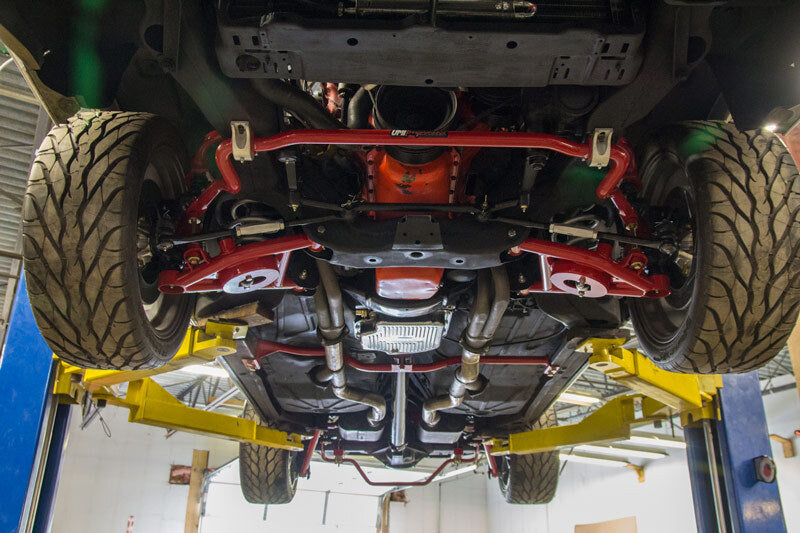 UMI Performance 3035-R 1.25in Solid Chrome Moly Front Sway Bar Red