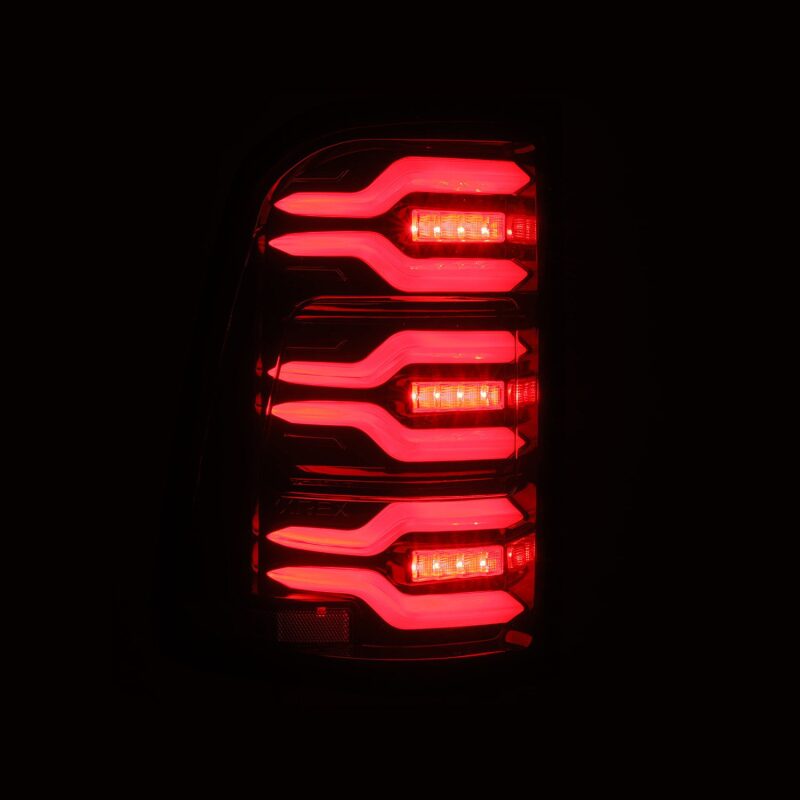 AlphaRex 640050 19-21 Dodge Ram 1500 Luxx-Series LED Tail Lights Black/Red w/Activation Light/Sequential Signal