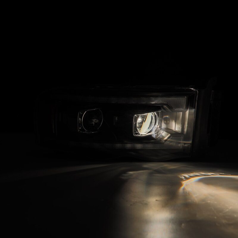 AlphaRex 880570 02-05 Dodge Ram 1500 PRO-Series Projector Headlights Plank Style Black with Sequential Signal