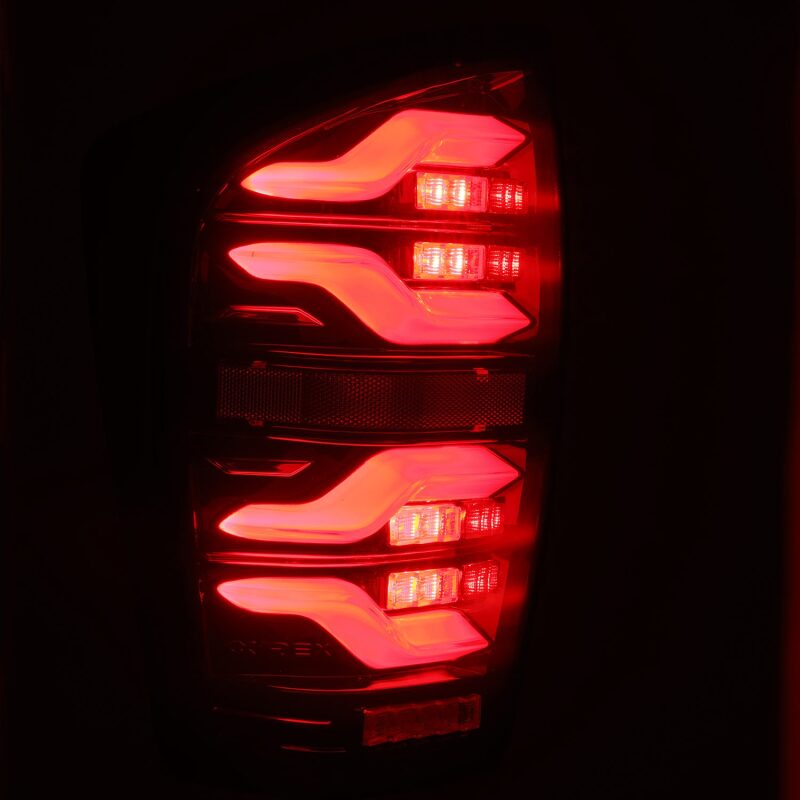 AlphaRex 680000 16-21 Toyota Tacoma LUXX LED Taillights Black/Red w/Activation Light/Sequential Signal