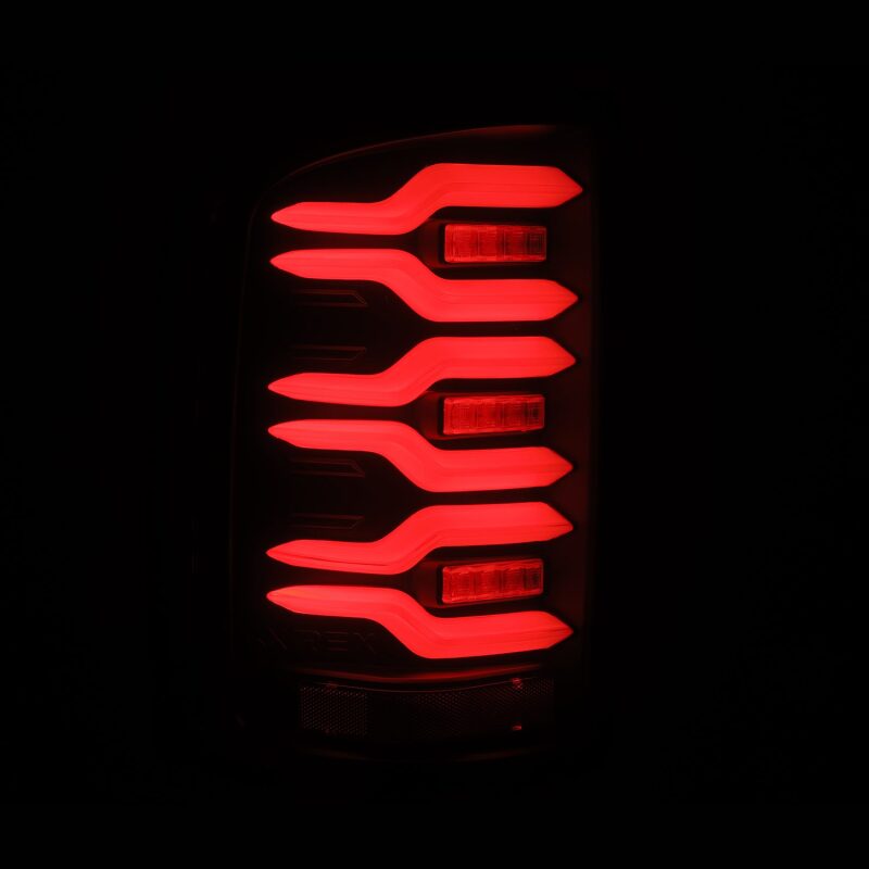 AlphaRex 630040 14-18 GMC Sierra 1500/2500 HD/3500 HD LUXX-Series LED Tail Lights Black w/Activation Light & Sequential Signal